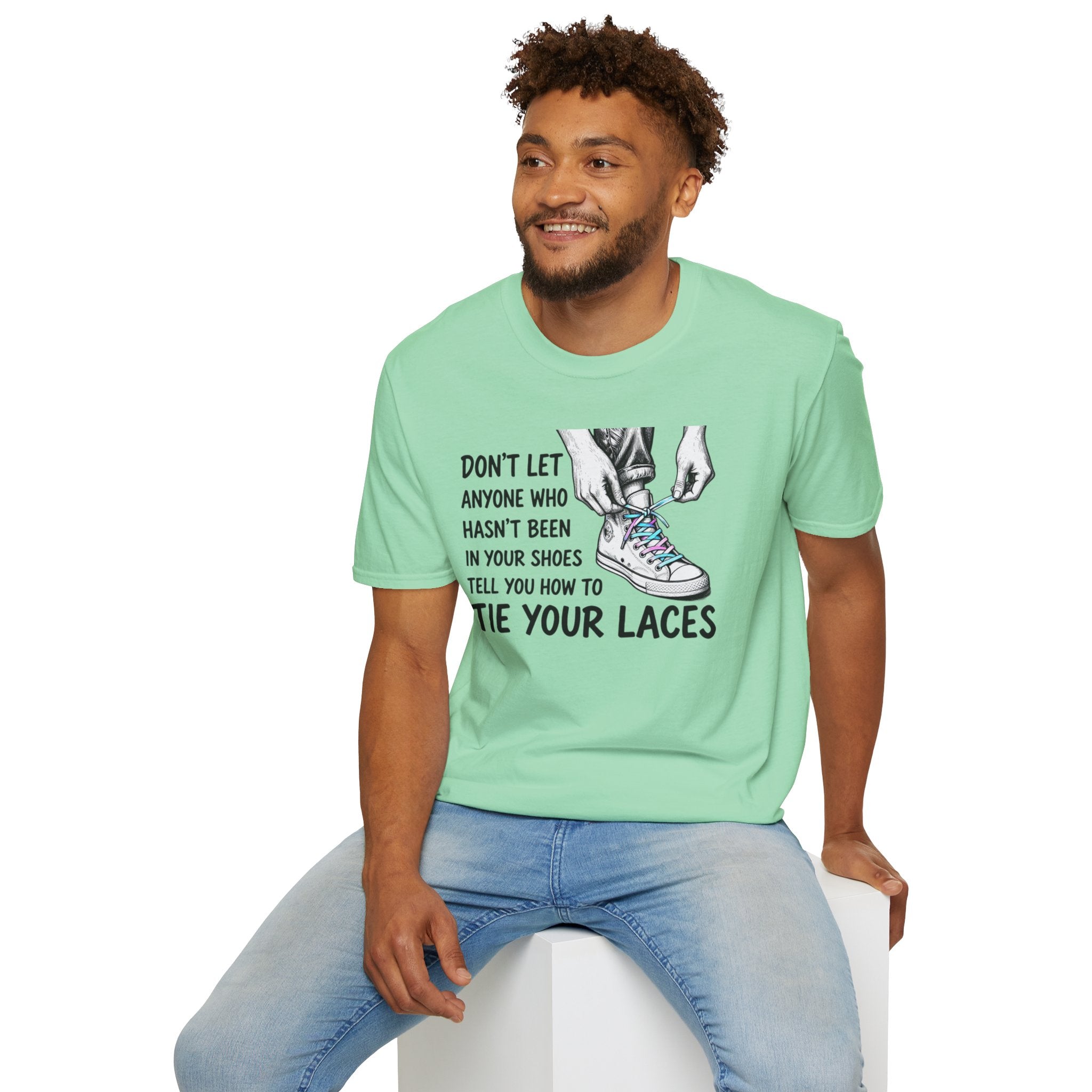 Don't Let Anyone T-Shirt — “Don’t Let Anyone Who Hasn’t Been In Your Shoes Tell You How To Tie Your Laces” Trans Colors