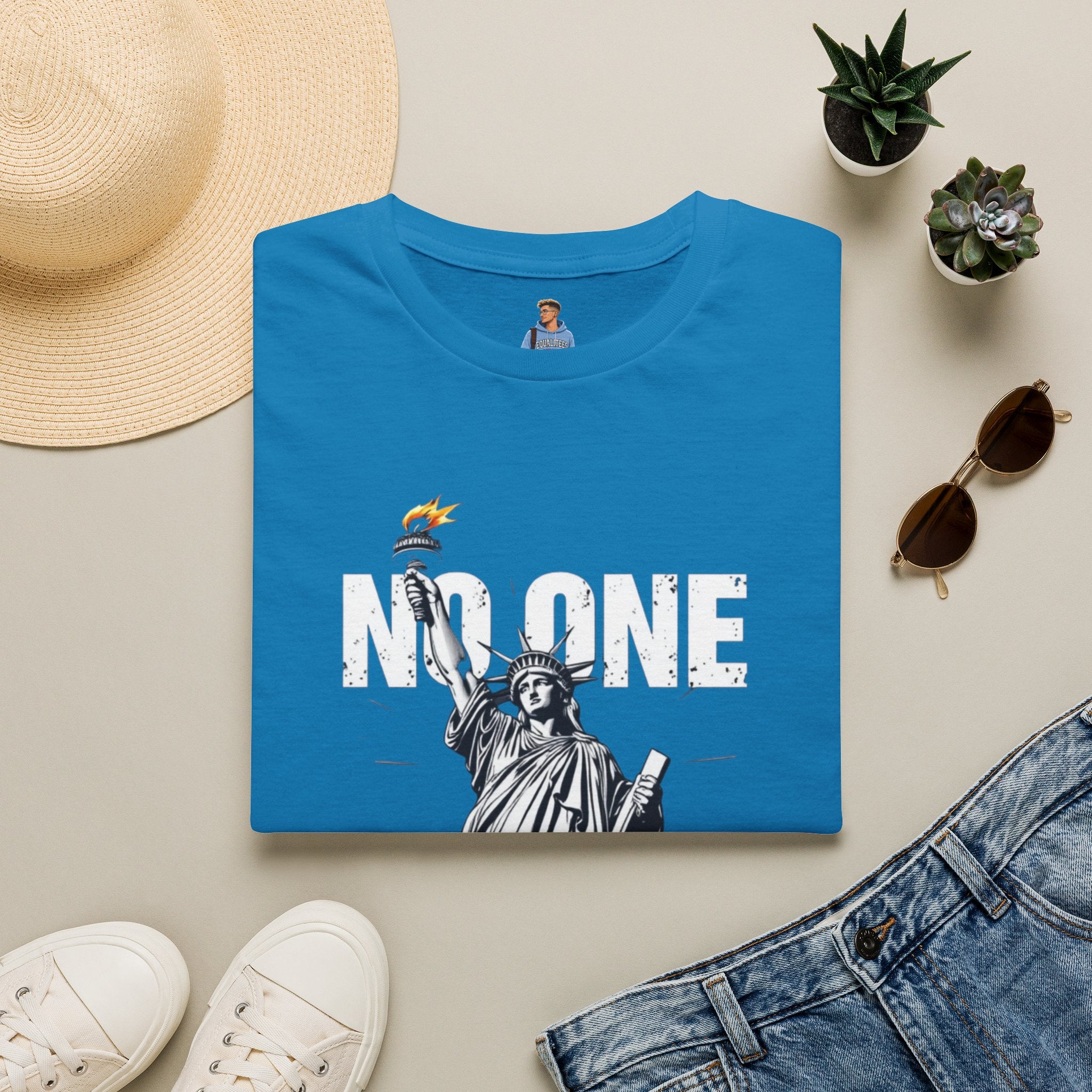 Camiseta unisex de estilo suave: camiseta gráfica con el lema "Nadie es ilegal" para defensores de la justicia social