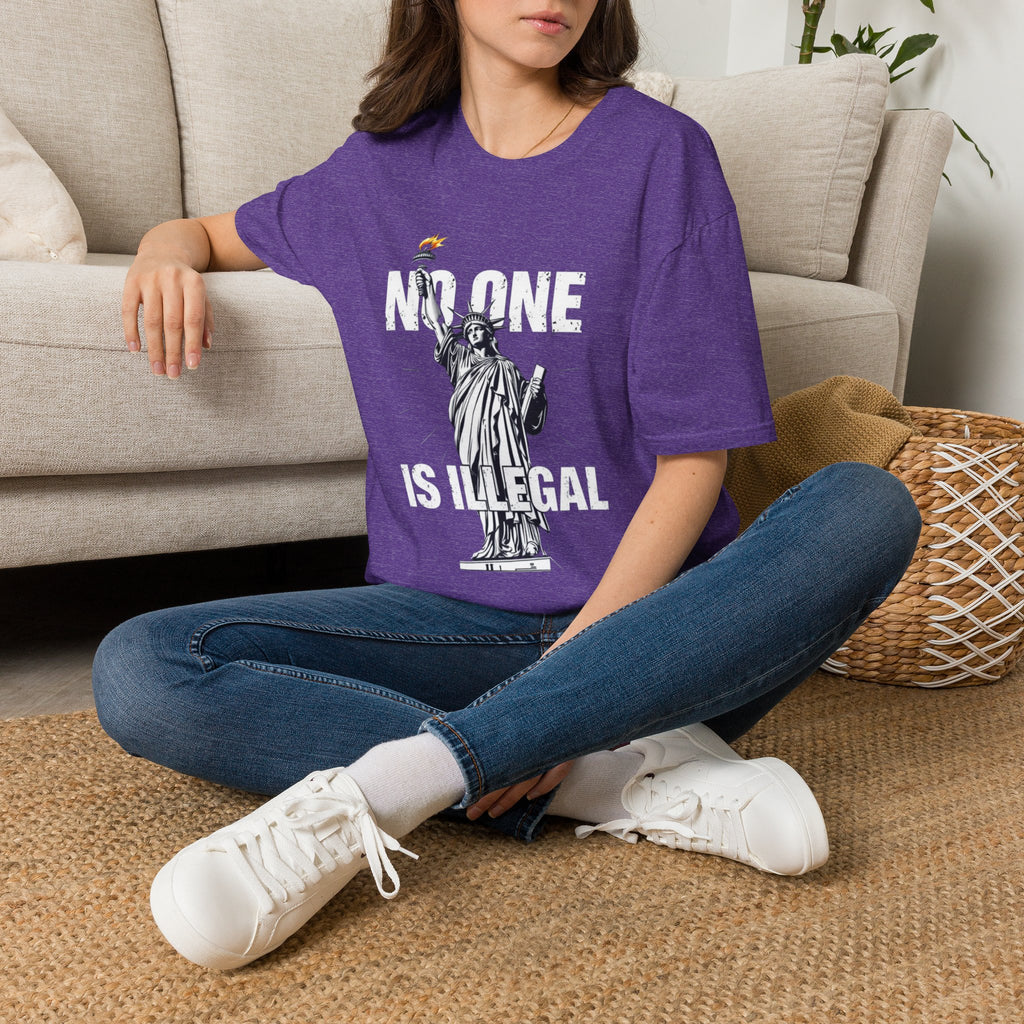 Camiseta unisex de estilo suave: camiseta gráfica con el lema "Nadie es ilegal" para defensores de la justicia social